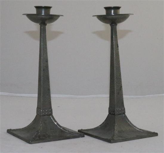 A pair of James Dixon & Sons planished pewter candlesticks, 8.75in.